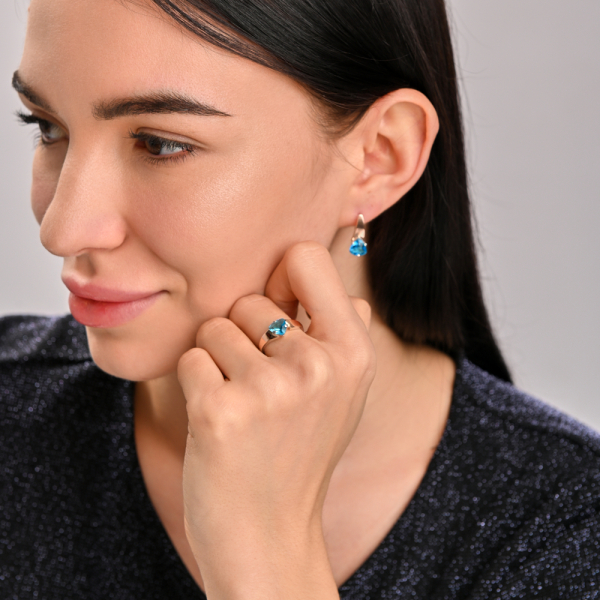 Срібна каблучка з золотими вставками