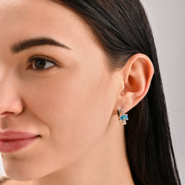 Срібні сережки з золотими пластинами