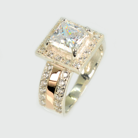 Срібна каблучка з золотими вставками