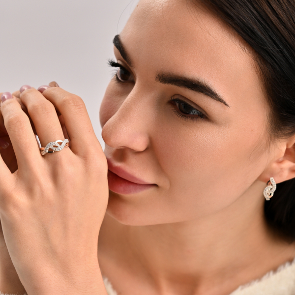 Срібна каблучка з золотими напайками і фіанітами