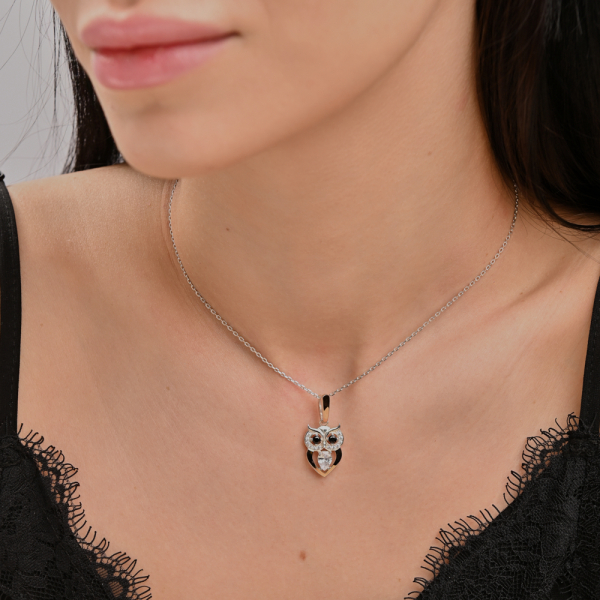 Серебряная подвеска с золотими вставками