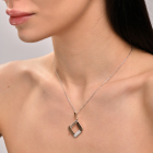 Срібна підвіска з пластинами золота