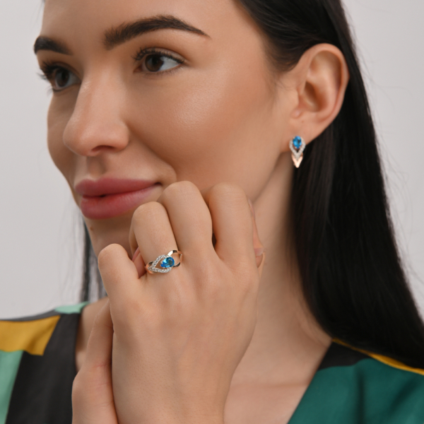 Срібна каблучка з золотими вставками