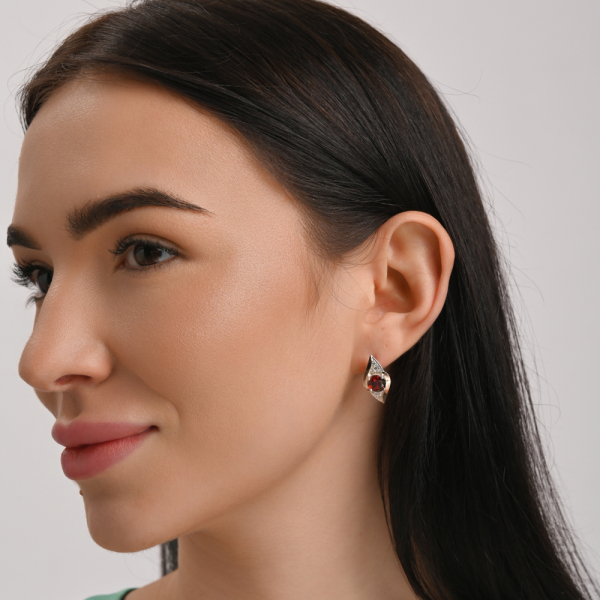 Срібні сережки з золотими вставками