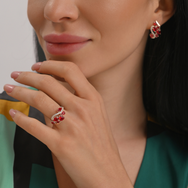 Срібна каблучка з золотими вставками