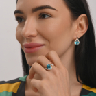 Срібна каблучка з золотими вставками