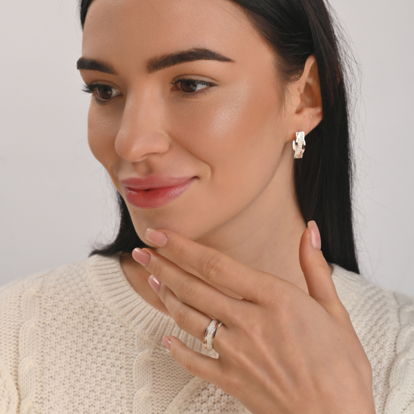 Срібна каблучка з золотими вставками