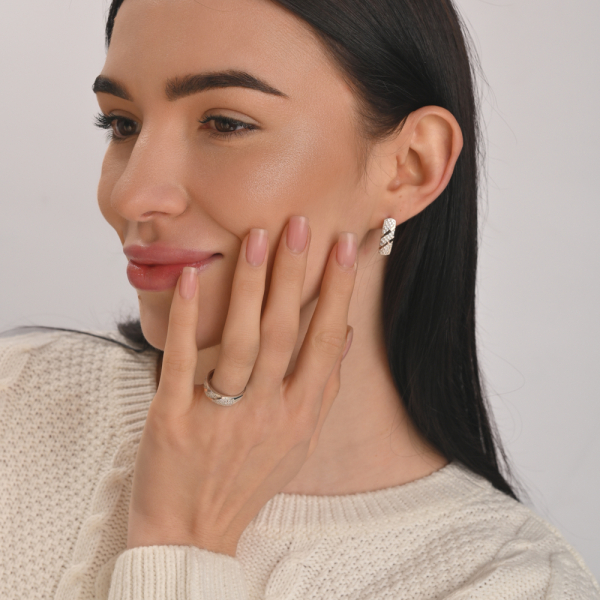 Срібна каблучка з золотими вставками