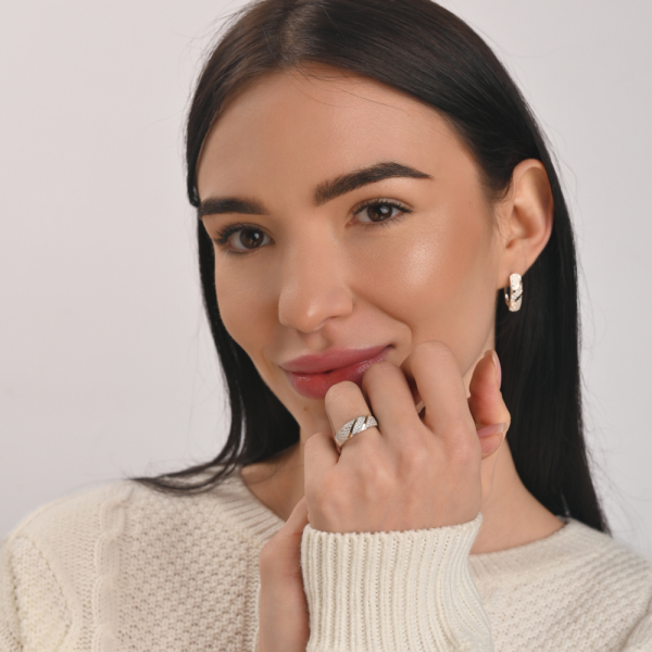 Срібна каблучка з золотими вставками