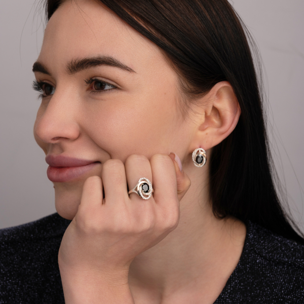 Срібна каблучка з золотими вставками