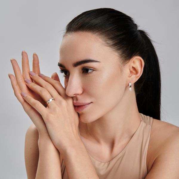 Срібна каблучка з золотими вставками