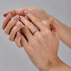 Срібна каблучка з золотими вставками