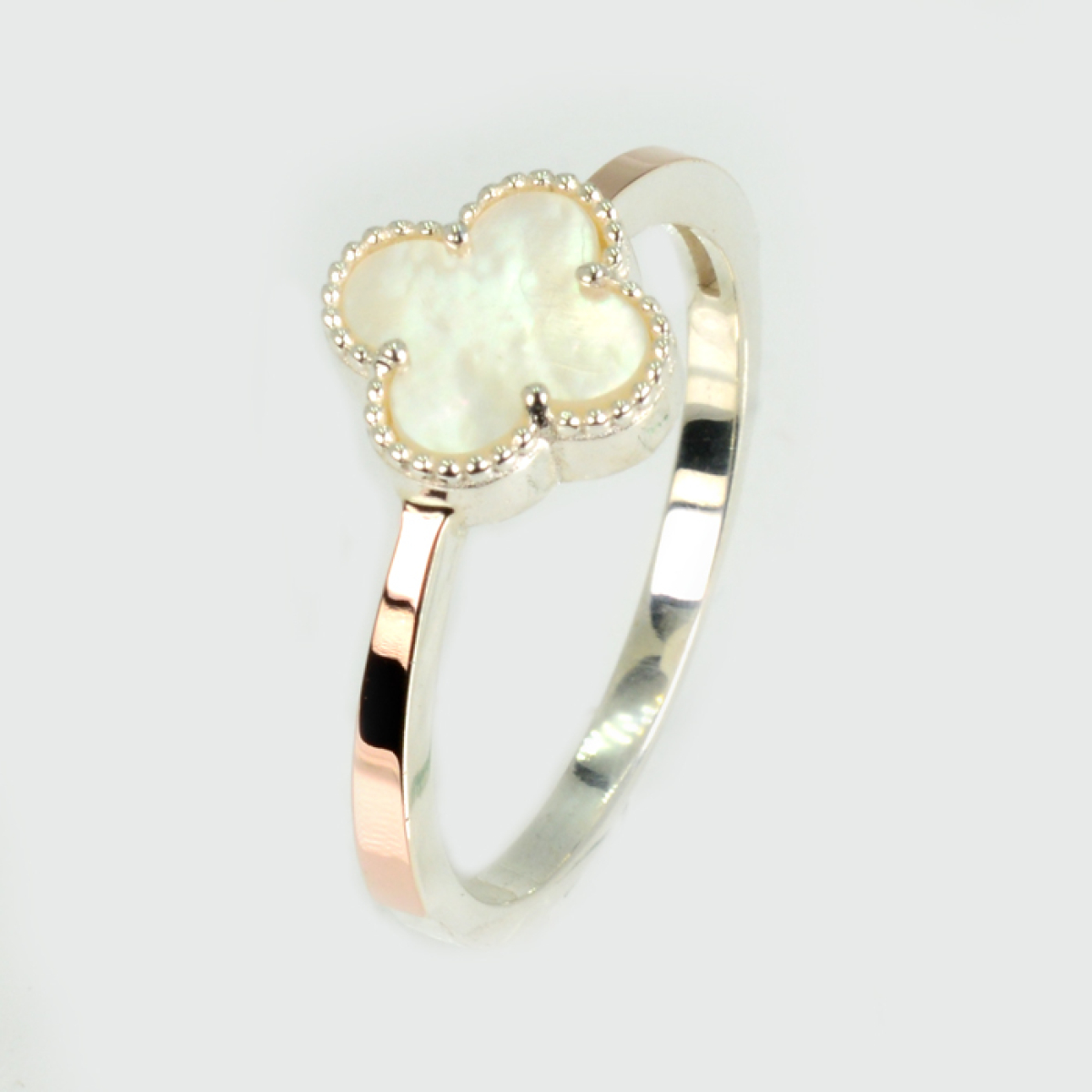 Срібна каблучка з конюшиною та золотими вставками