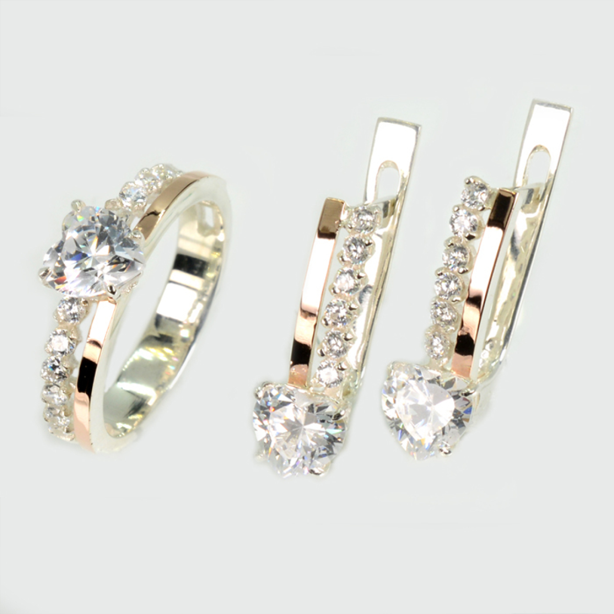 Срібний набір з золотими пластинами