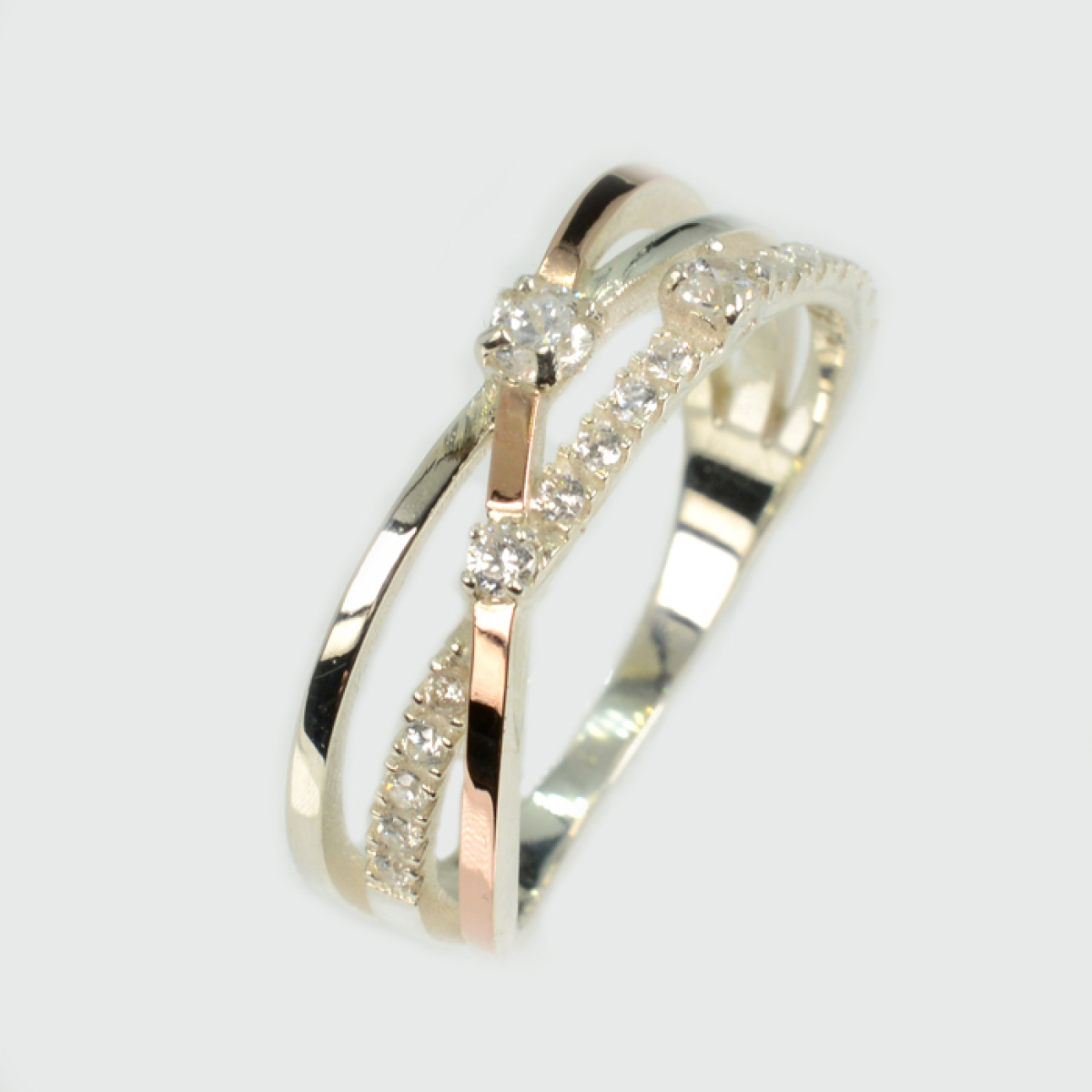 Срібна каблучка з золотими вставками